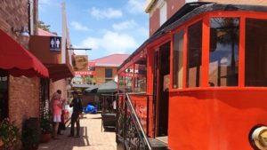 Red tram at the entrance of Amasterdam bar on the Frontstreet in Philipsburg