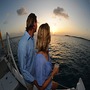 Two people watching the sunset during a Tango Cruise Dinner